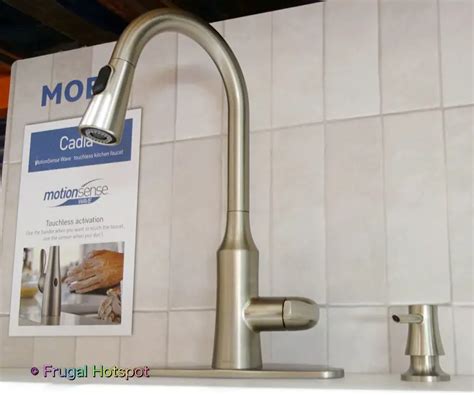Costco faucet - Delta Berkley Pulldown Kitchen Faucet and Soap Dispenser MagnaTite® Docking Uses a Powerful Integrated Magnet to Snap Your Faucet Spray Wand Precisely into ...